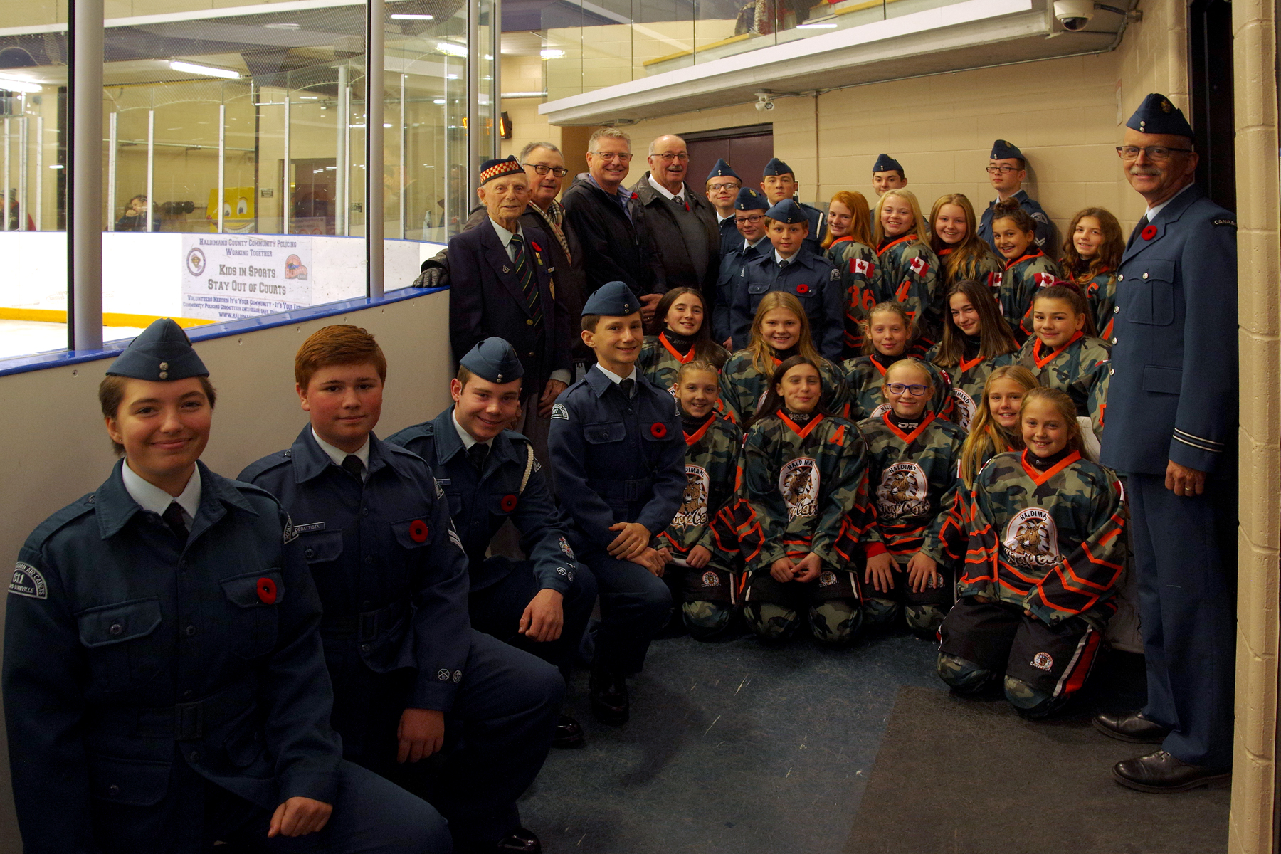 Air Cadets, youth hockey players, veterans and officers at the 2019 Tribute to the Troops event