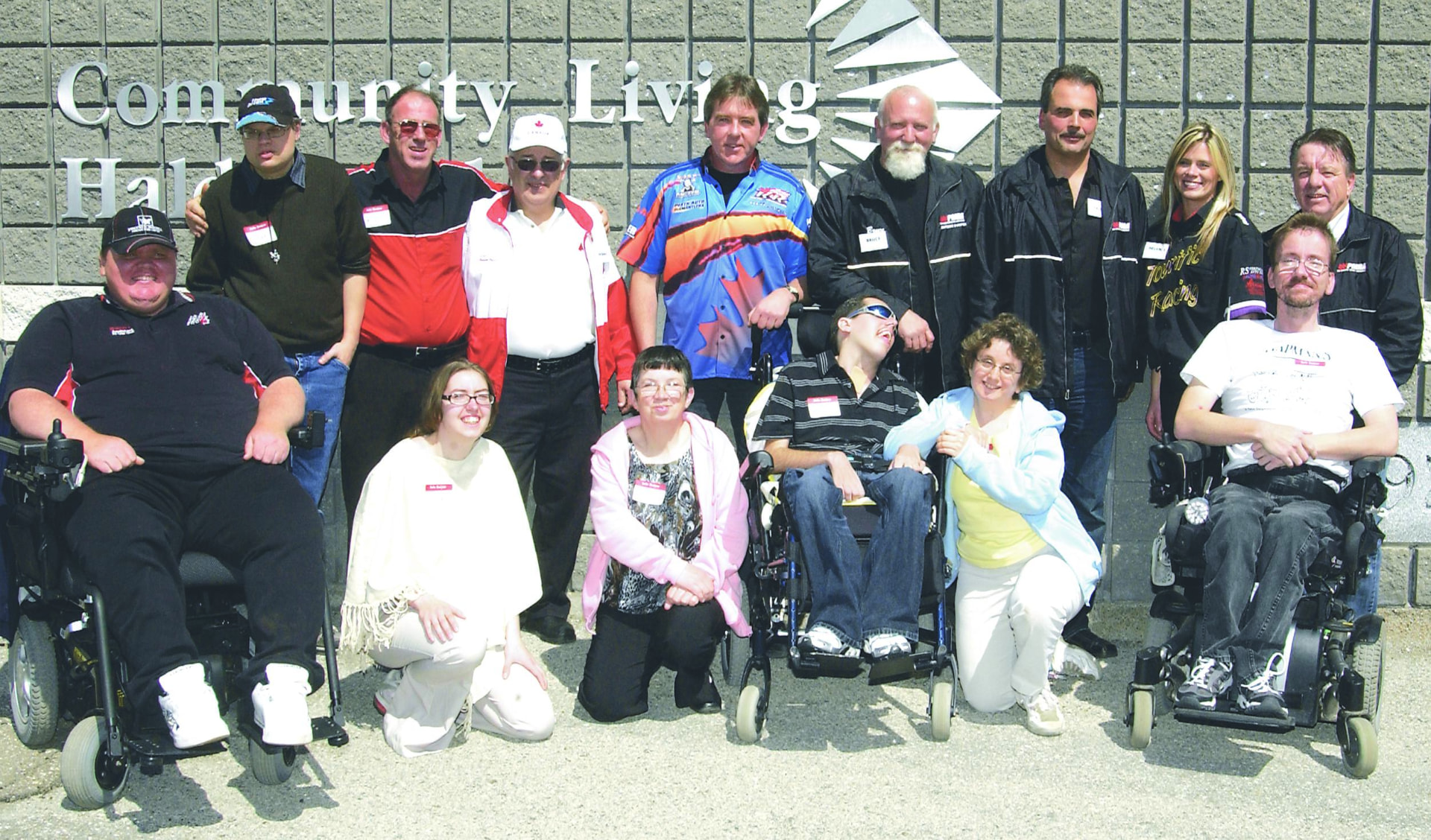 Motorsport Showcase (2005–2012) — participants, drivers and volunteers outside Community Living Haldimand